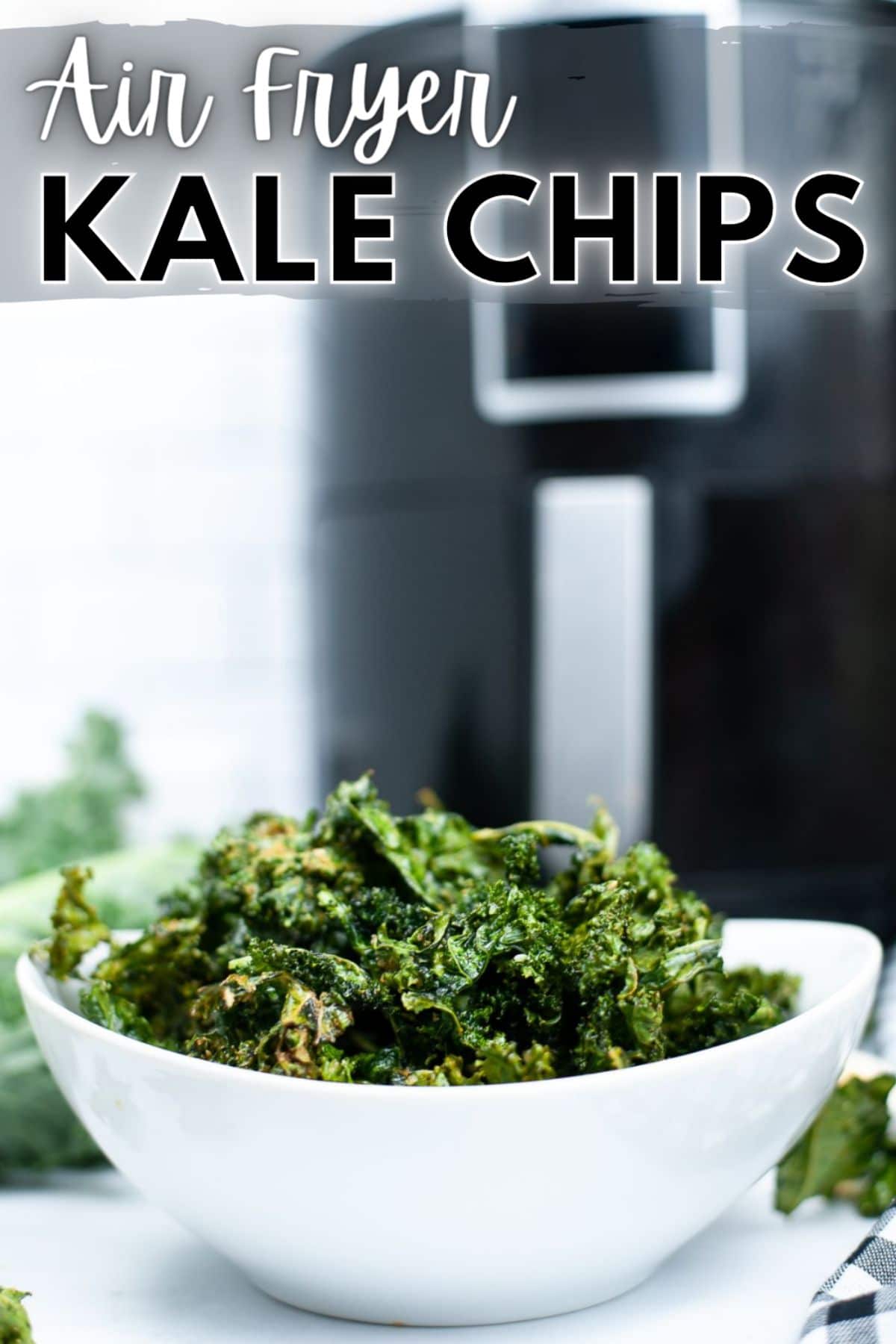 Air Fryer Kale Chips are crispy healthy chips bursting with salt and garlic flavors. These chips are so tasty even the kids will enjoy them! #airfryer #kalechips #lowcarb #keto #recipe via @wondermomwannab
