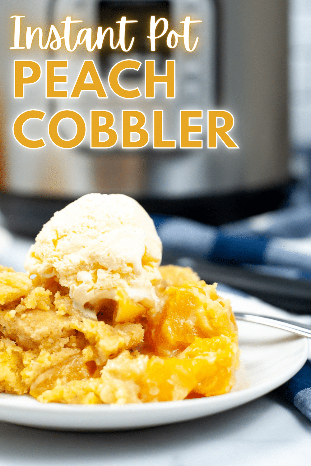  A vertical zoomed in image of Instant Pot Peach Cobbler with a scoop of ice cream, emphasizing the layers of the peach cobbler, and with a text above it saying "Instant Pot Peach Cobbler".