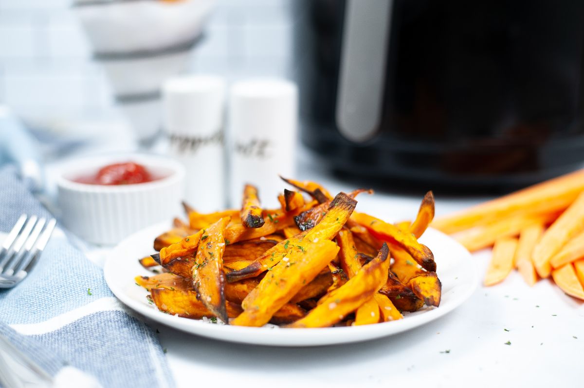Air Fryer Potato Fries on a white serving plate.