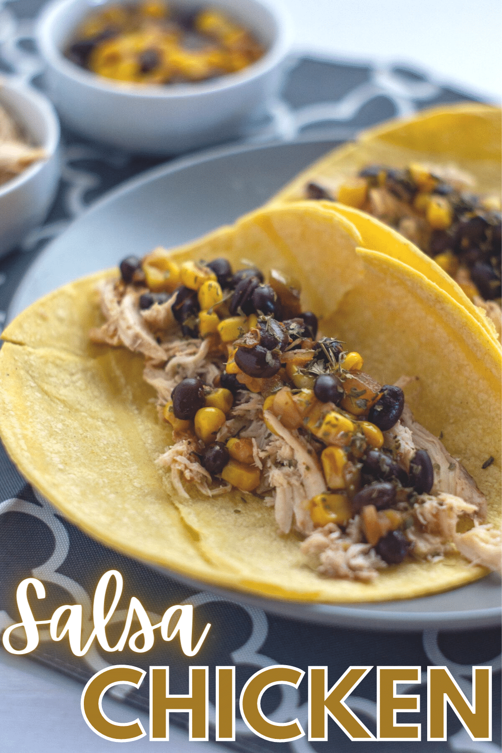 A vertical image of Salsa Chicken in tacos with title text at the bottom part reading "Salsa Chicken".