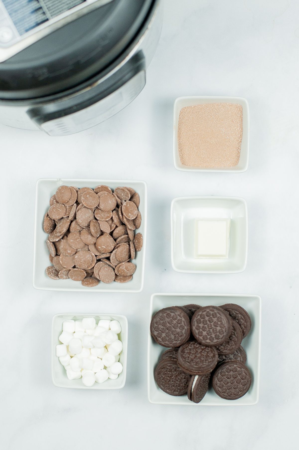 Ingredients used to make Cookies and Cream Hot Cocoa Bombs.