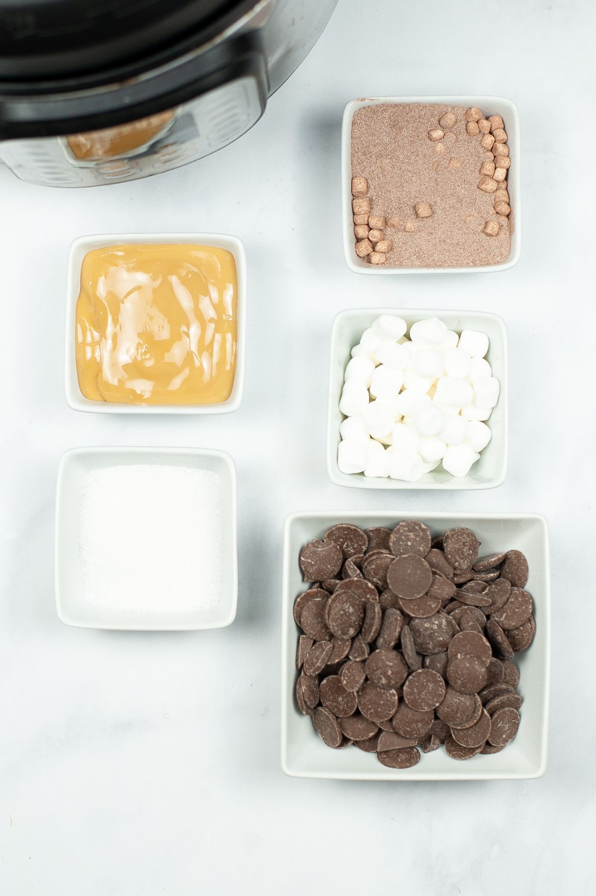 Ingredients used to make Instant Pot Salted Caramel Hot Cocoa Bombs.