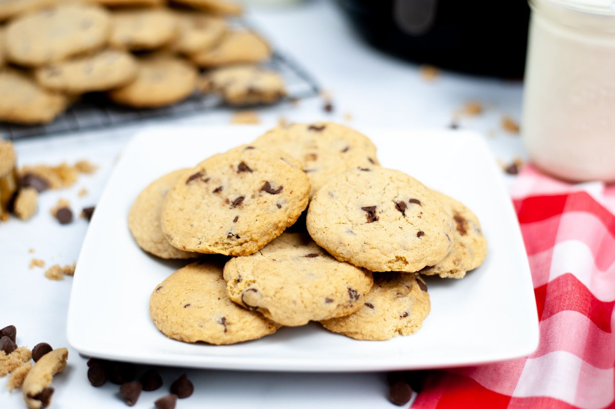Air Fryer Chocolate Chip Cookies on a white serving plate.