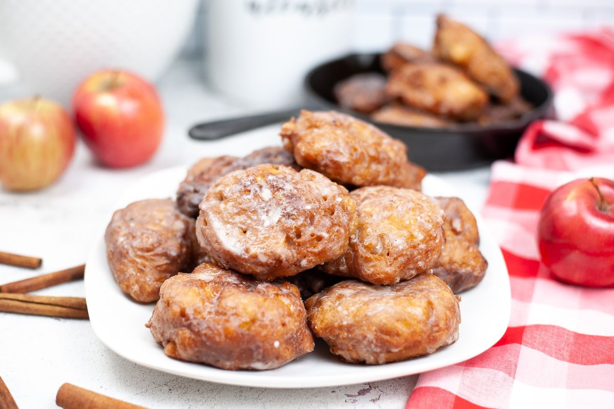 Apple Fritters on a white serving plate.