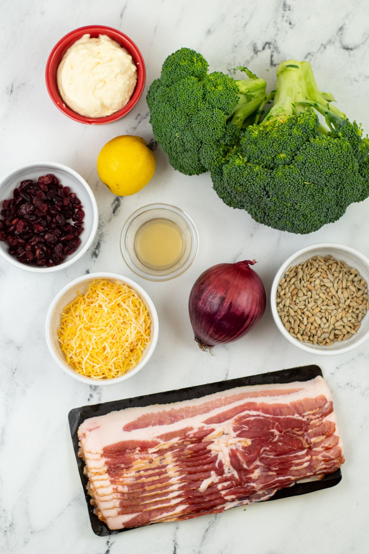 Ingredients used to make Broccoli Bacon and Cheese Salad.