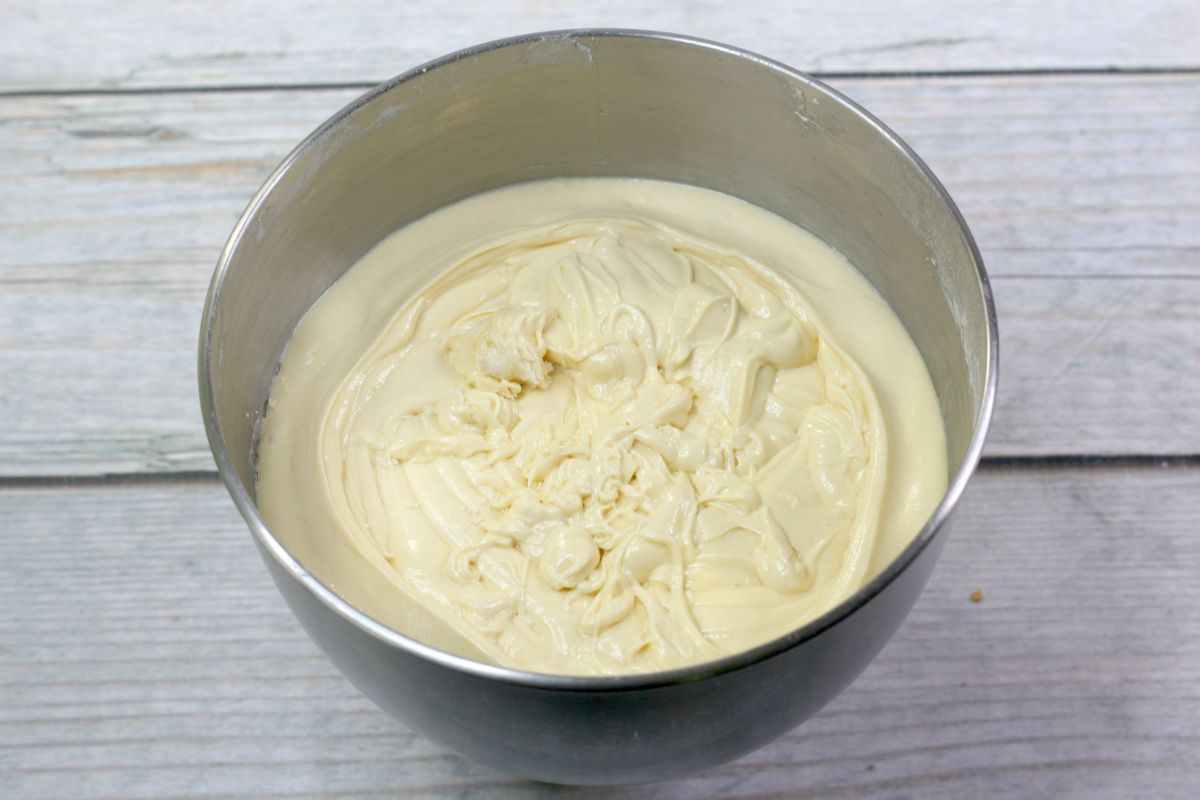 angel food cake mix batter in round stainless bowl