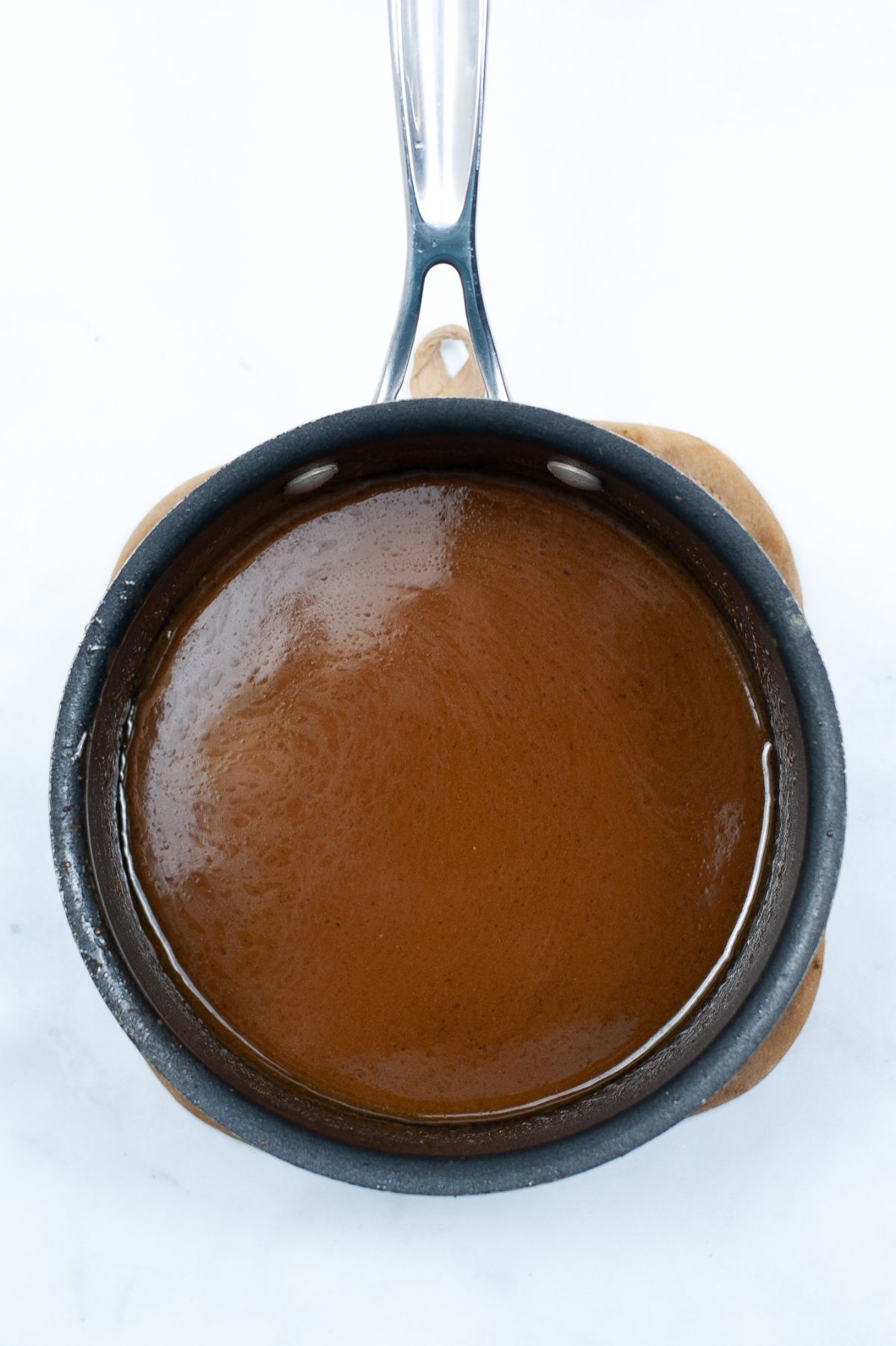 Melted Sugar, butter and milk in a sauce pan.