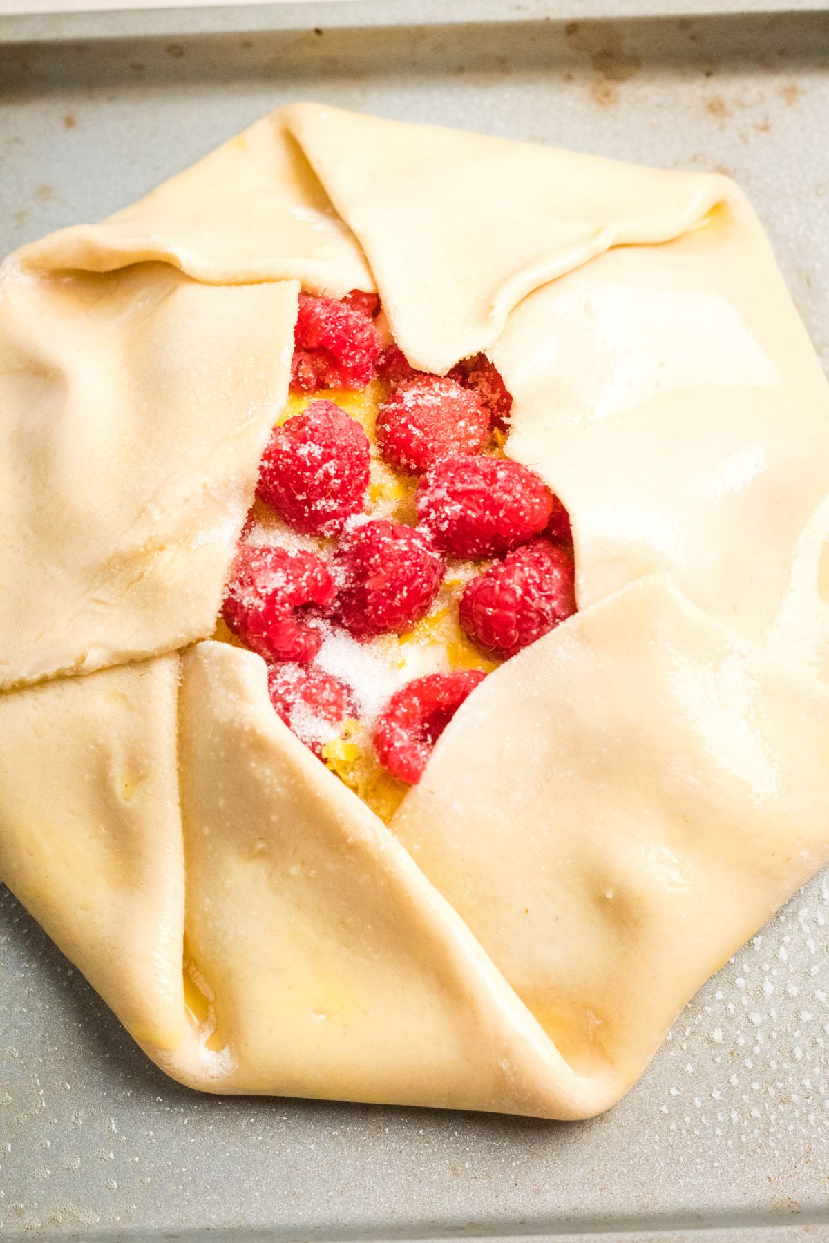 Fold the crust into the raspberry and cream cheese inside. 