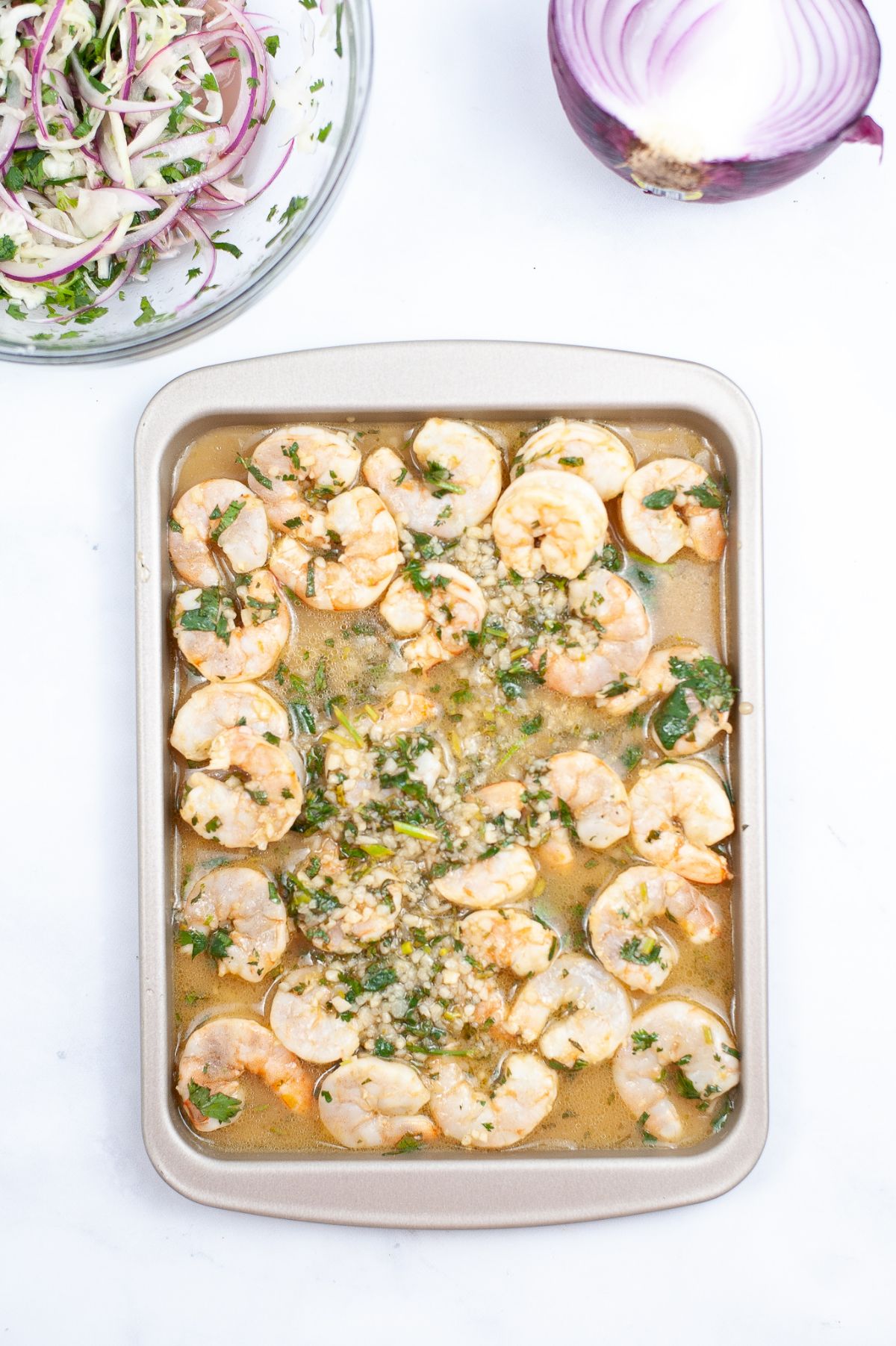 Cooked marinated shrimp in a baking pan