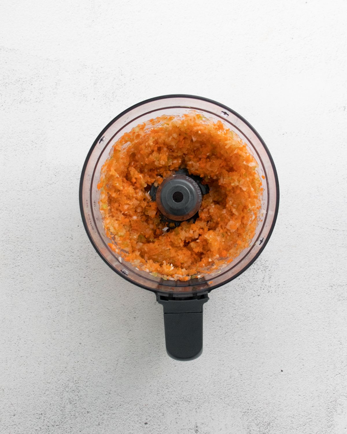 onion, carrot and celery in the food processor