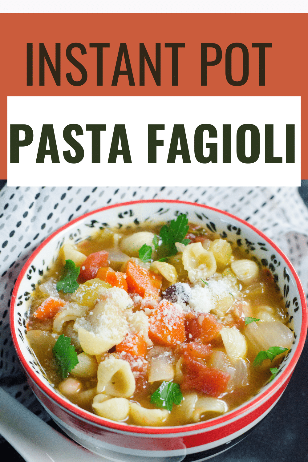 Instant Pot Pasta Fagioli in a bowl garnished with parsley leaves and parmesan cheese next to a cloth with title text reading Instant Pot Pasta Fagioli