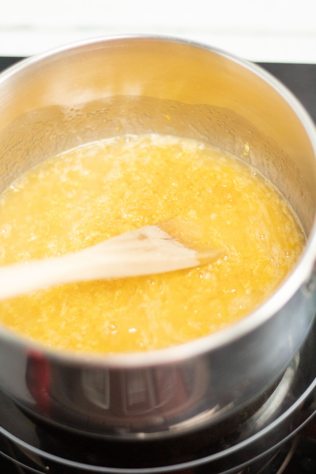Heat eggs, sugar and lemon juice in a sauce pan 