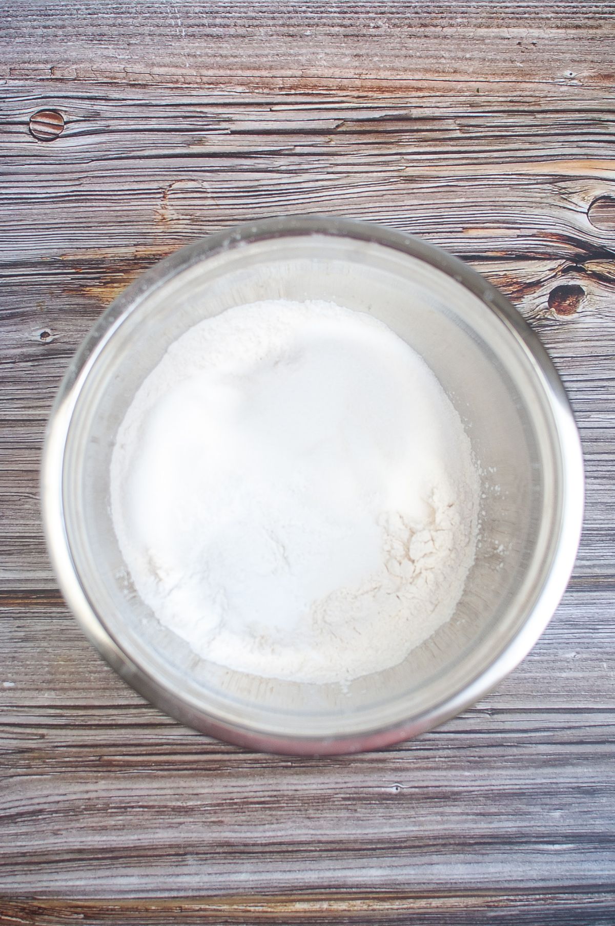 flour, baking powder, baking soda, and salt in a mixing bowl