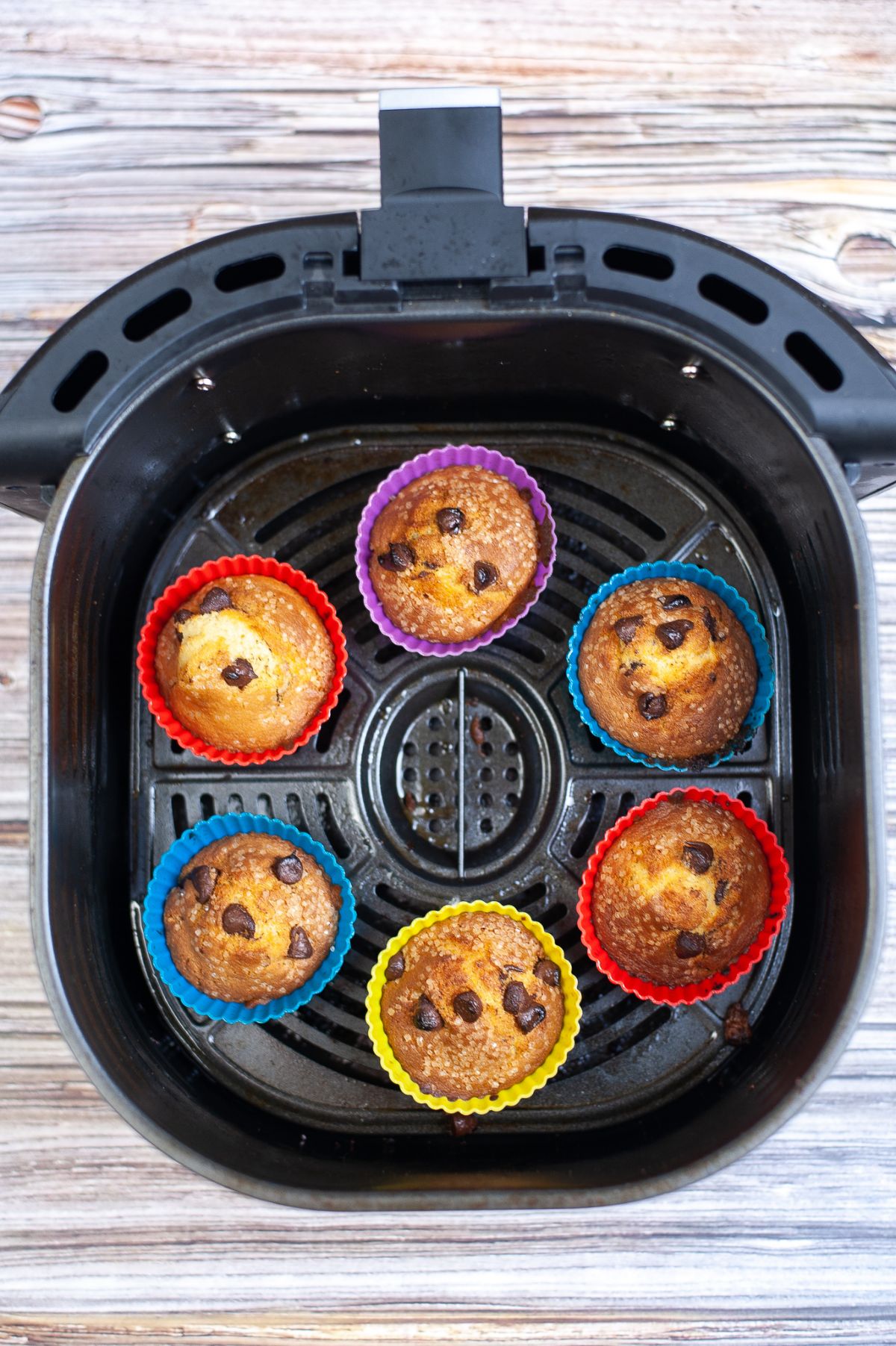 Cooked Chocolate Chip Muffins inside the air fryer