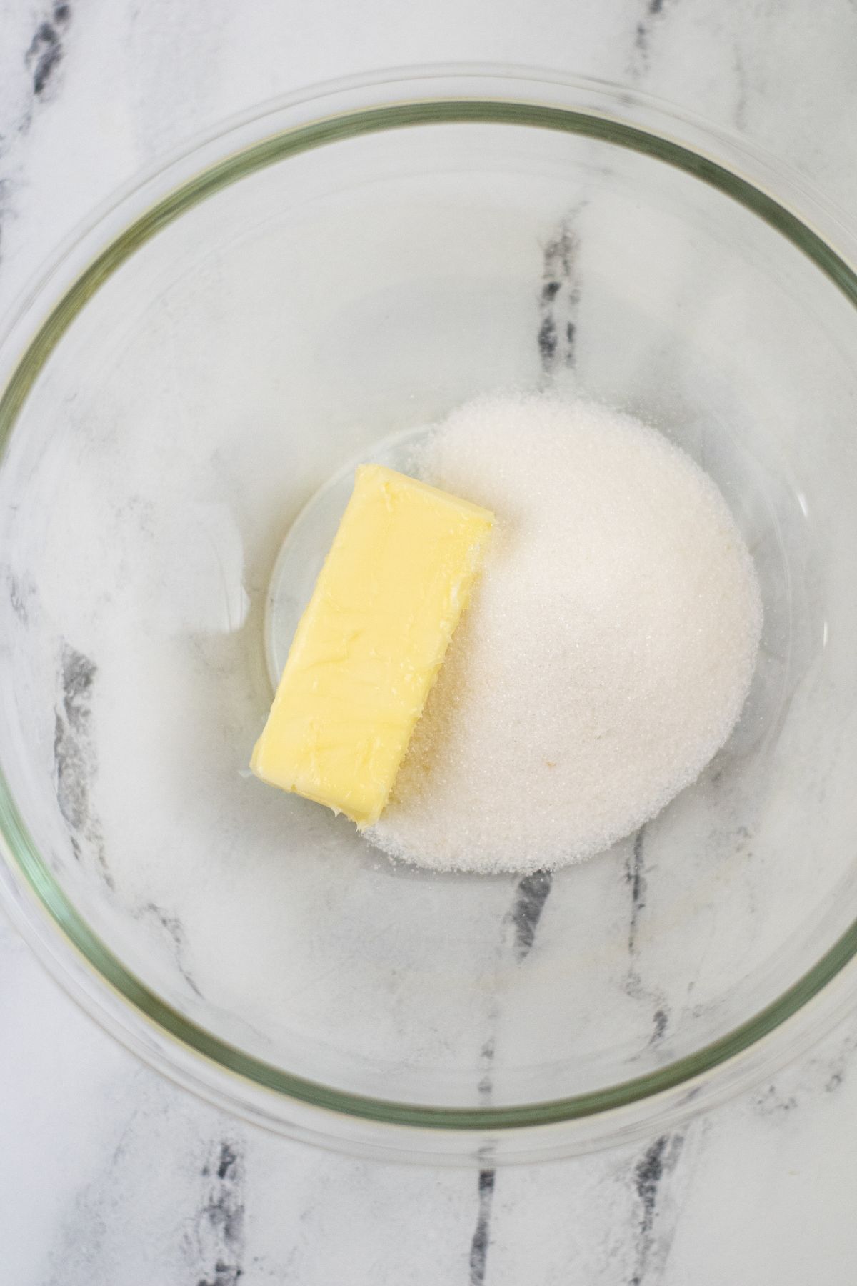 butter and sugar in a glass bowl 