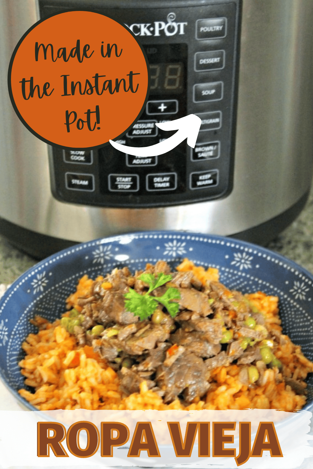 closeup of ropa vieja in a blue bowl with an instant pot in the background and title text reading Made In the Instant Pot Ropa Vieja
