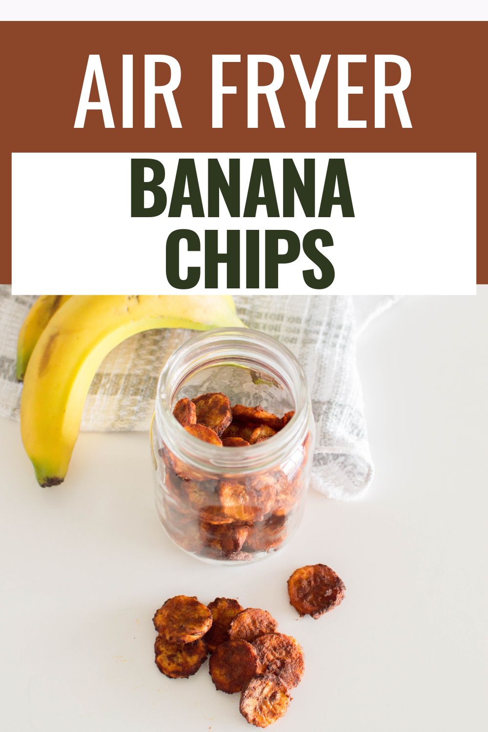 Banana Chips in a jar and on a table  with bananas on the side with title text reading Air Fryer Banana Chips