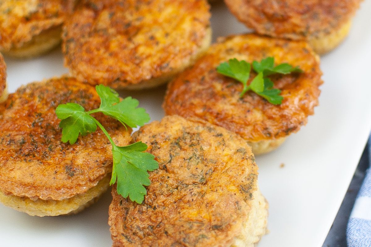 close up of Air Fryer Egg Bites on a plate garnished with parsley