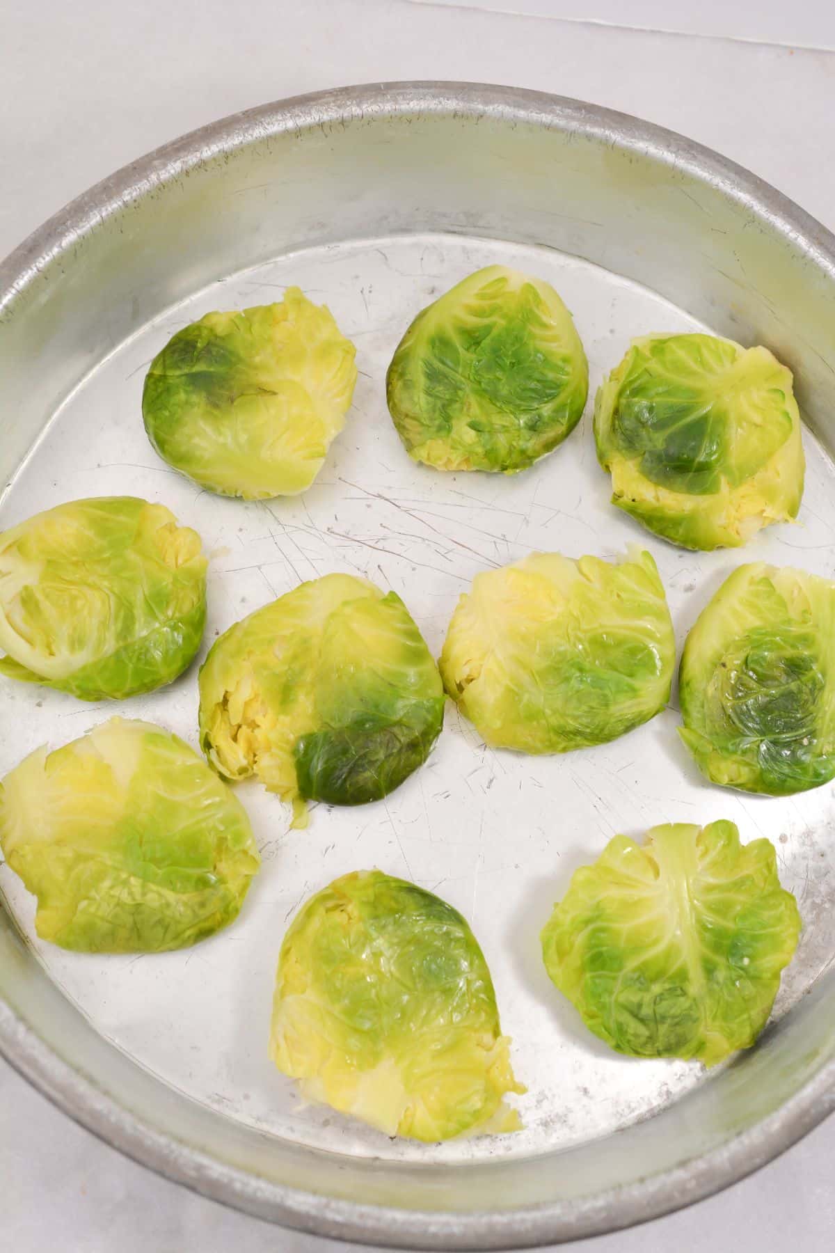Drained brussels sprouts in a pan