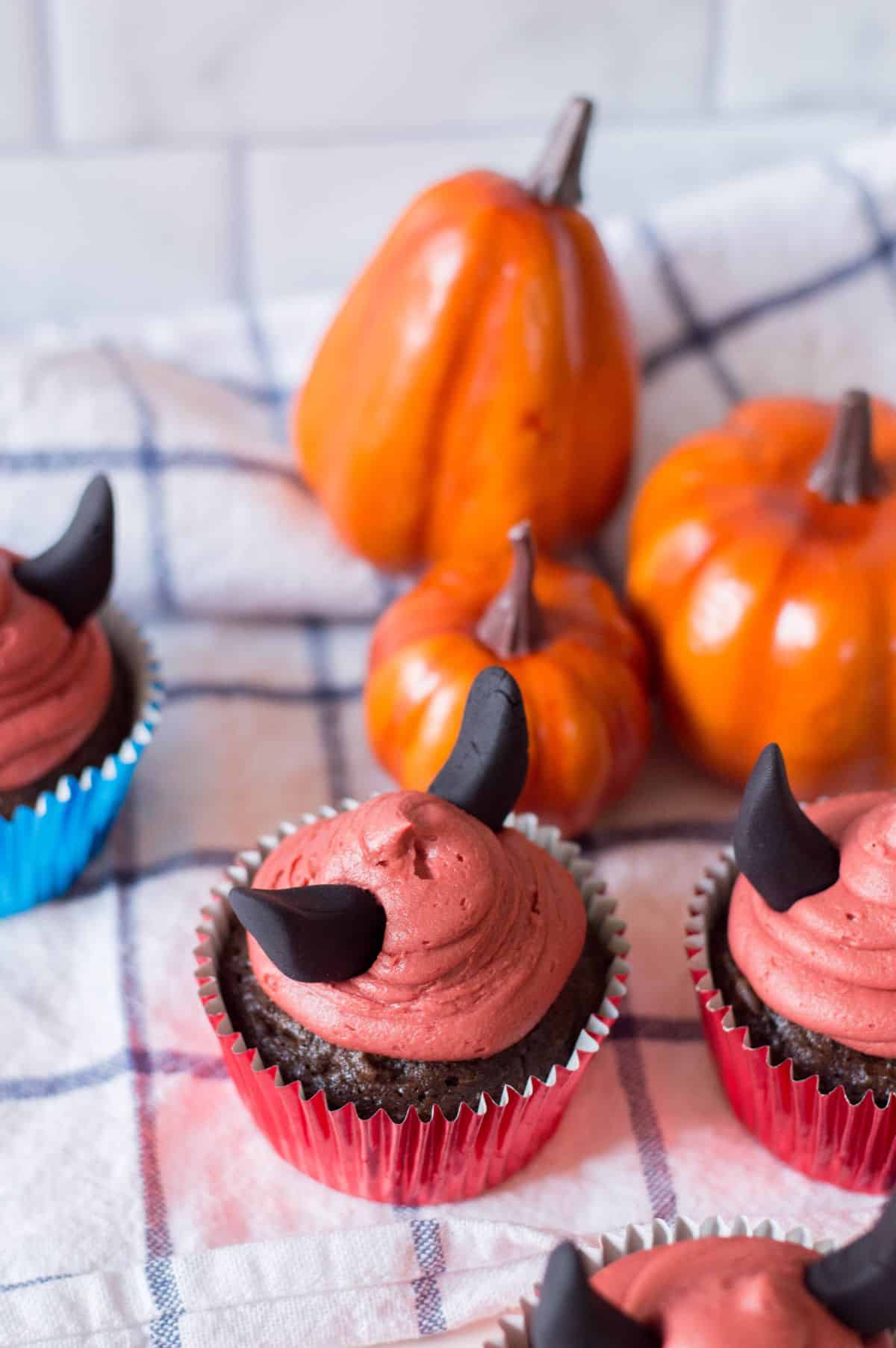 Halloween Devil Cupcakes with pumpkins on the side