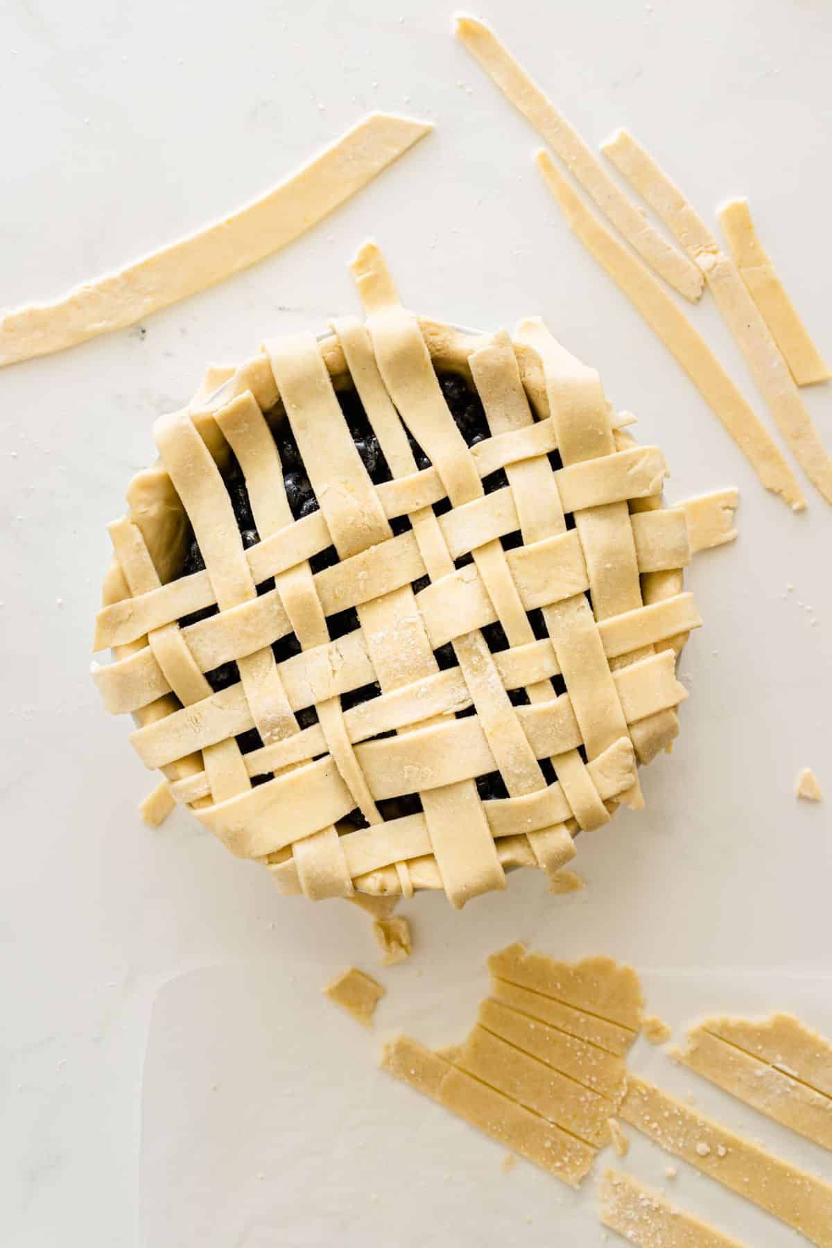 Weave the pie crust strips  to make a lattice