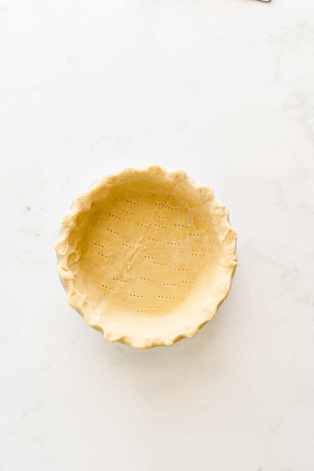 Pie crust pricked by a fork