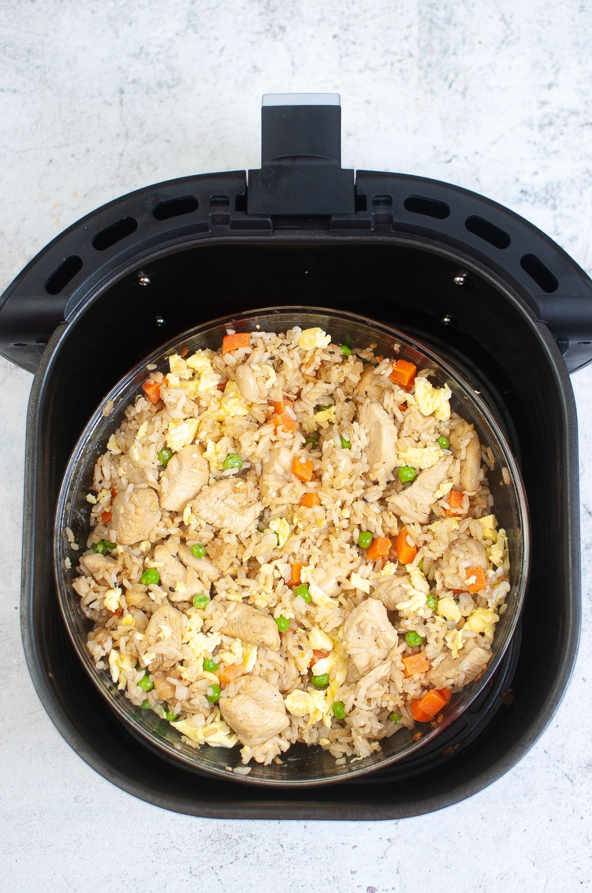 Fried rice with vegetables inside the Air Fryer.