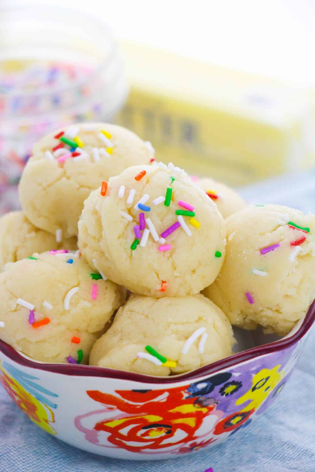 a closeup of Edible Sugar Cookie Dough with sprinkles in a serving bowl.
