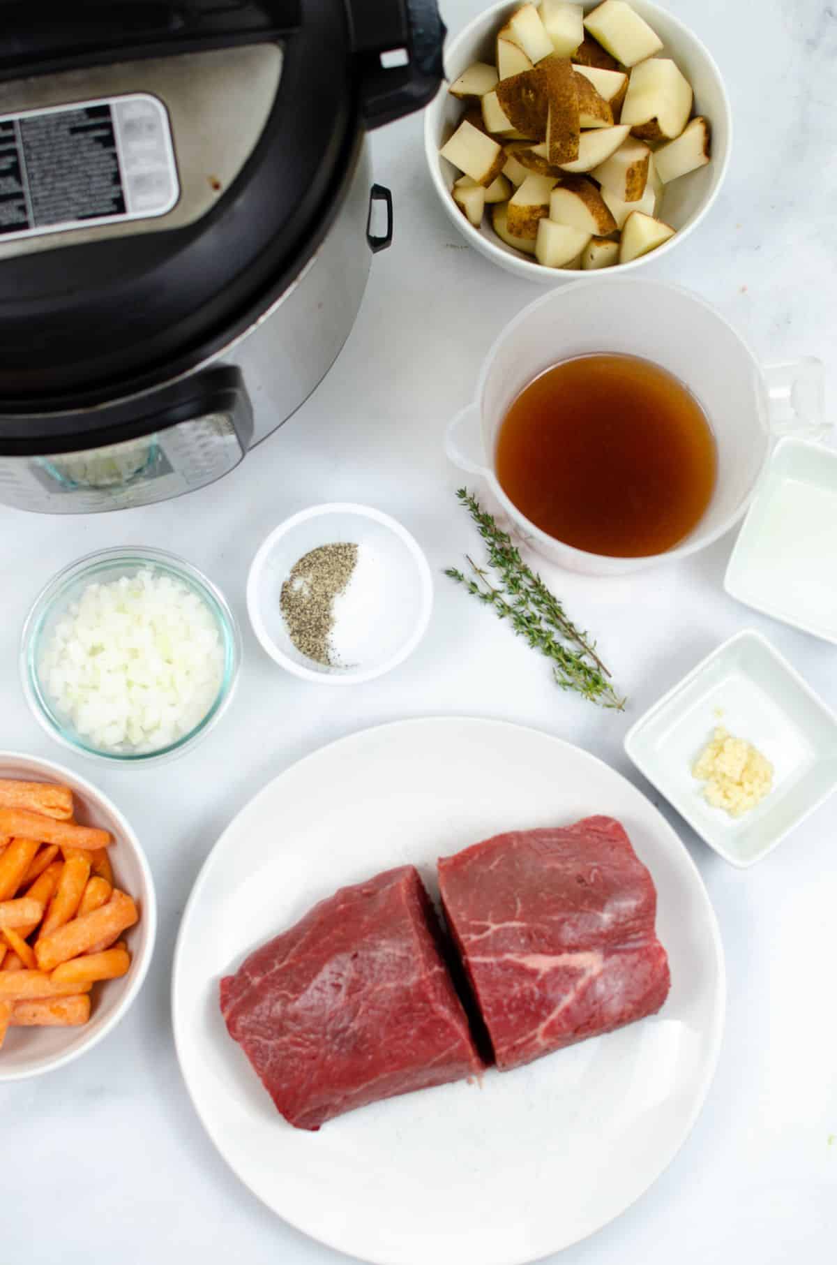 ingredients needed to make instant pot roast with potatoes and carrots.