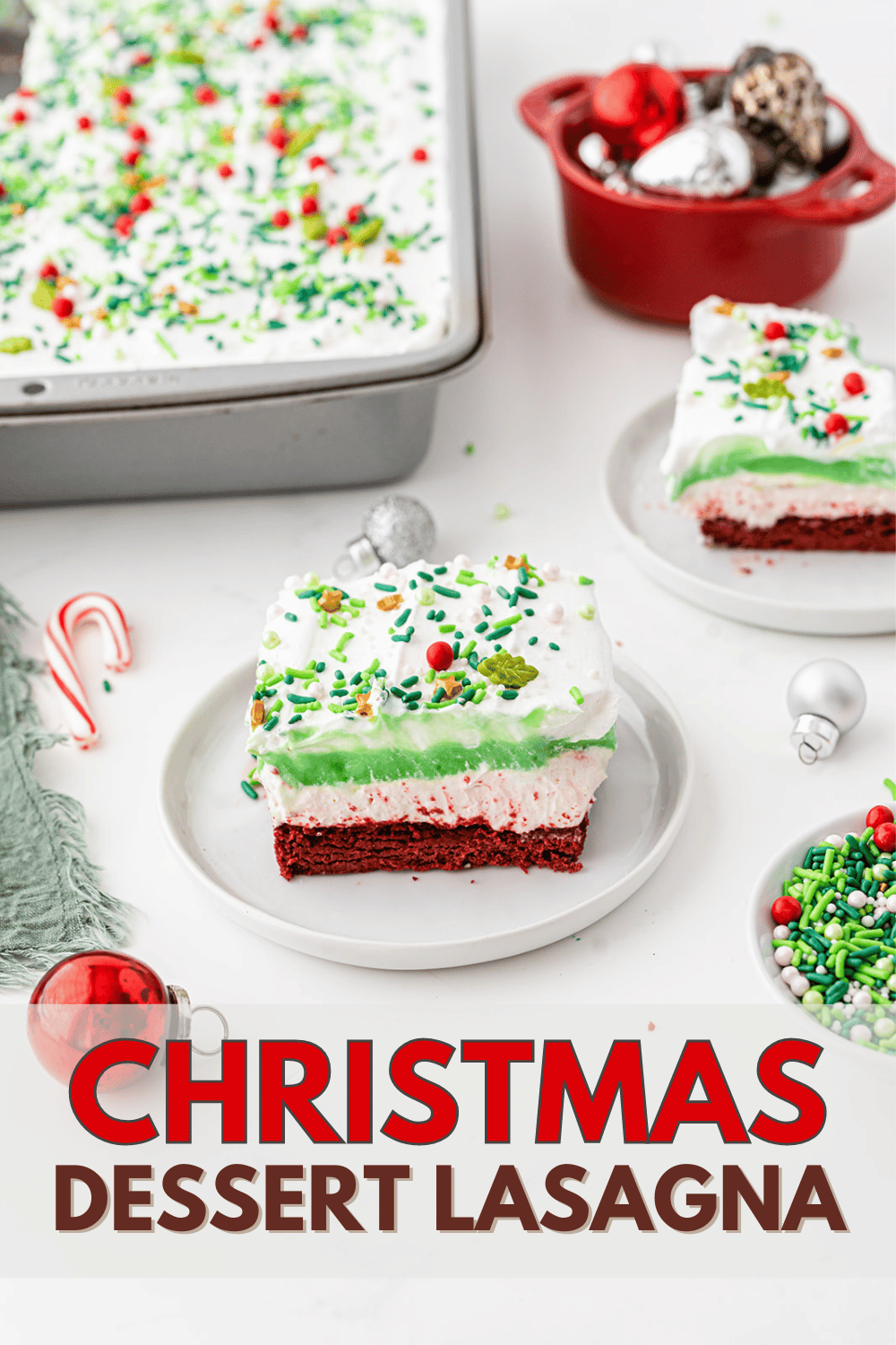 This Christmas Dessert Lasagna is made with delicious layers of red velvet brownies, and vanilla pudding, and topped with tangy peppermint. #christmasdessertlasagna #christmasdessert #dessertlasagna via @wondermomwannab