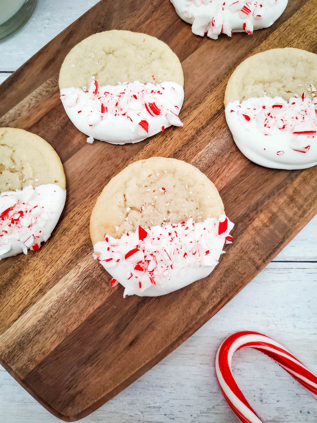 White Chocolate Peppermint Cookies on a wooden board.
