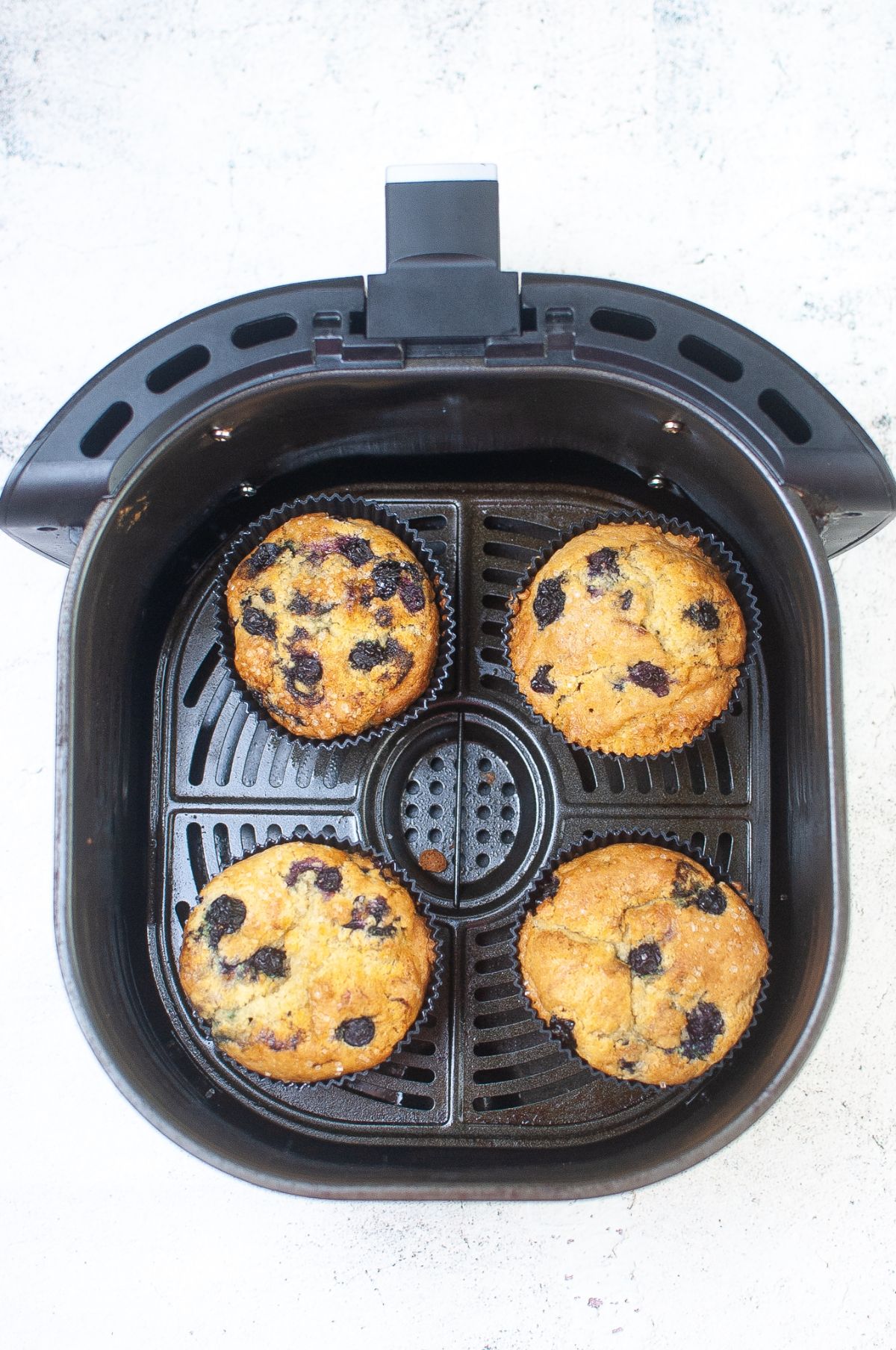 Blueberry muffins inside the Air Fryer.