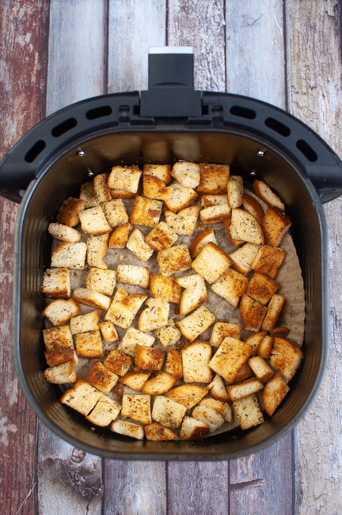 Croutons inside the Air Fryer.