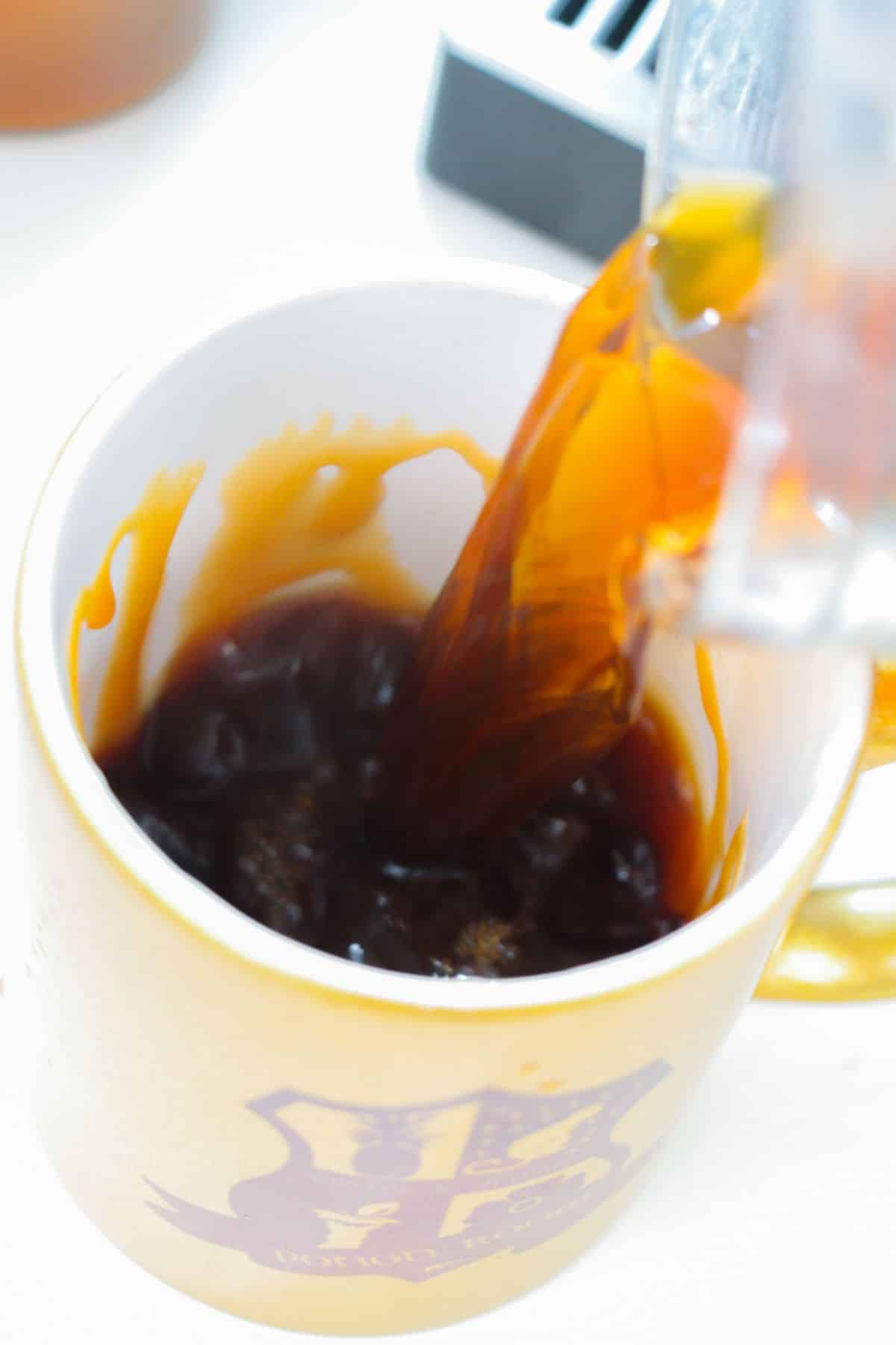 Added the espresso into the mug.