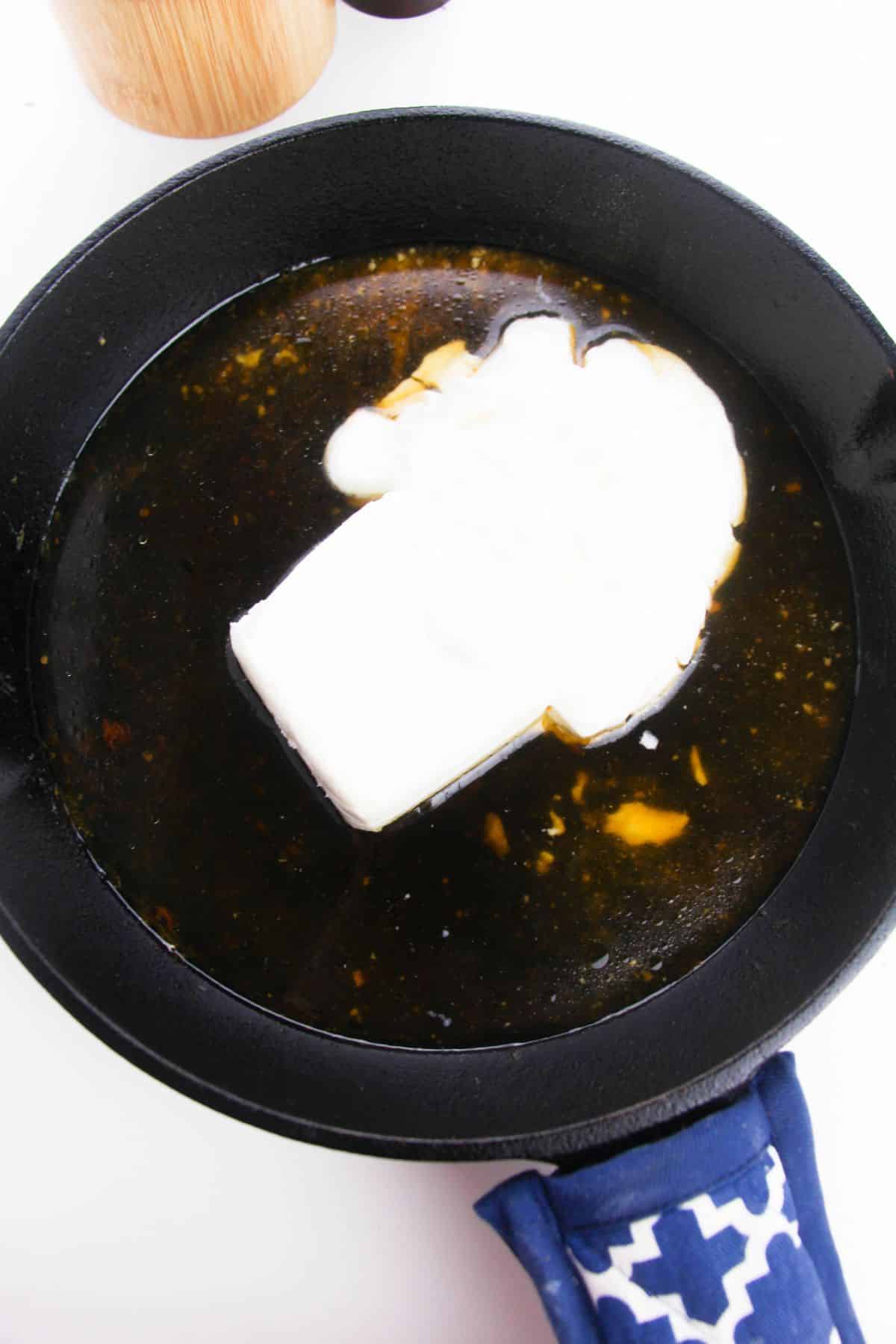 chicken broth, sour cream and cream cheese in a large skillet.