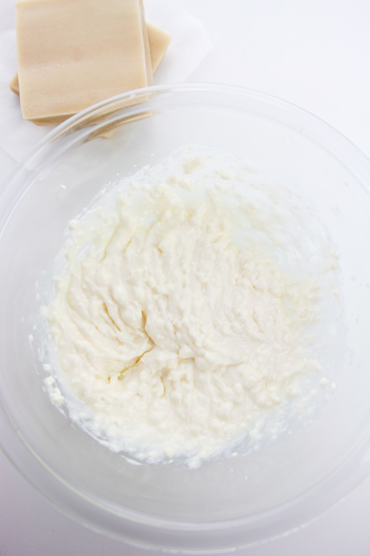 cream cheese, powdered icing sugar, vanilla extract and Greek yogurt or sour cream in a large bowl.