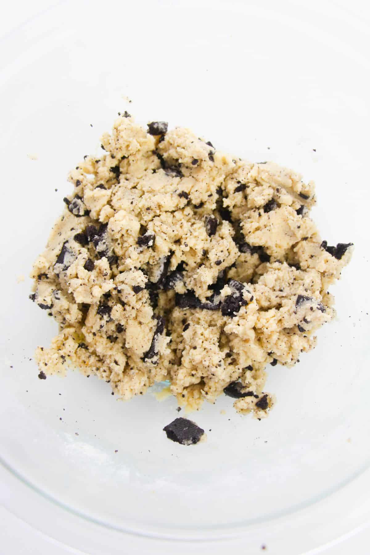 Crumble the OREO cookies into the dough.