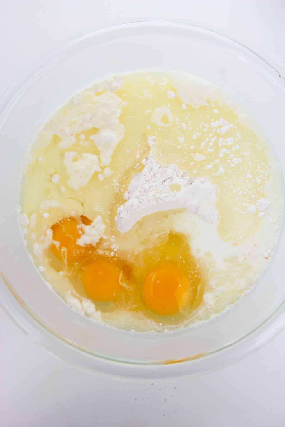 Cake mix, eggs and oil in a mixing bowl.