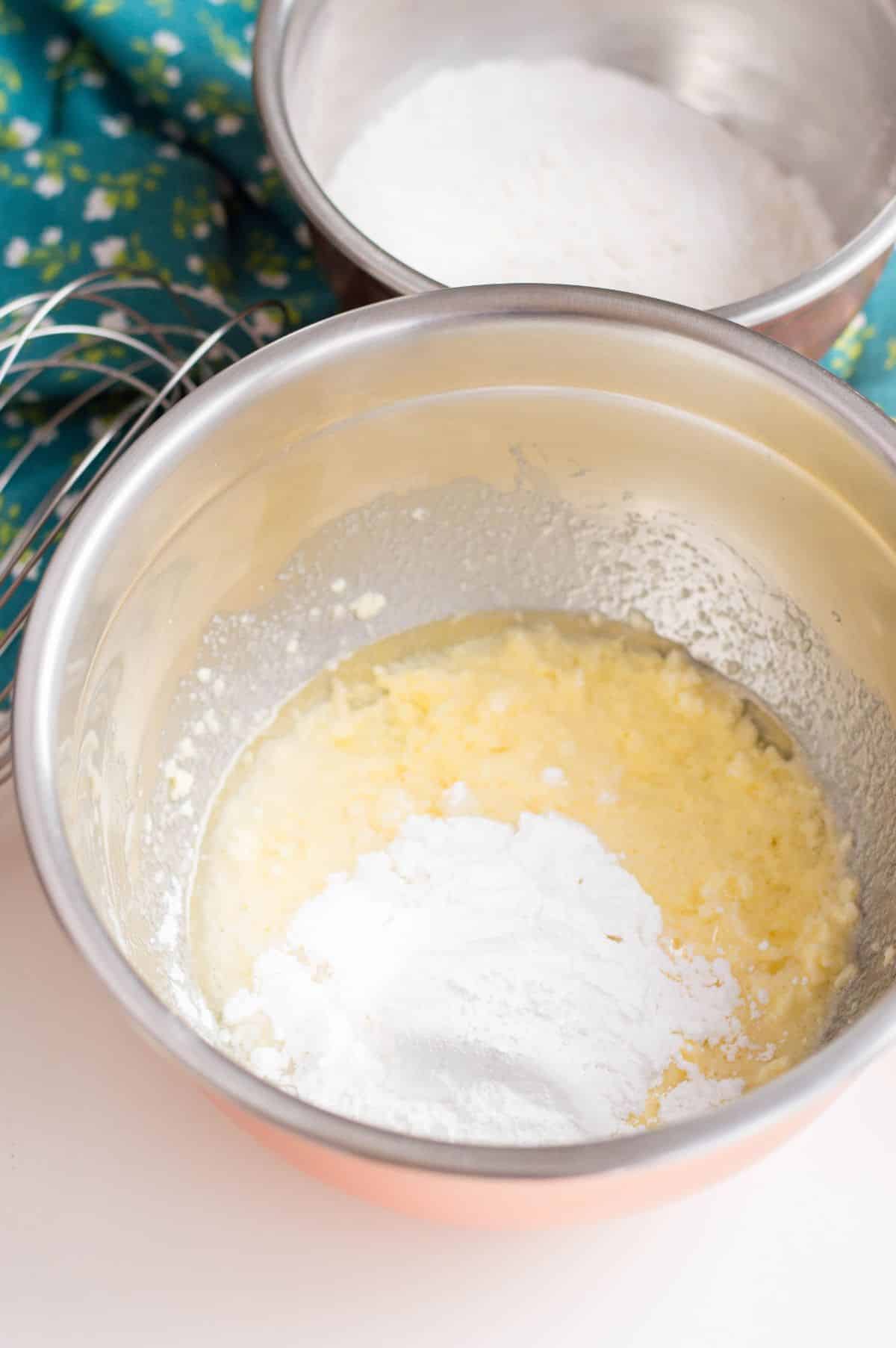 powdered sugar, oil, lemon juice and zest are added to the egg mixture.