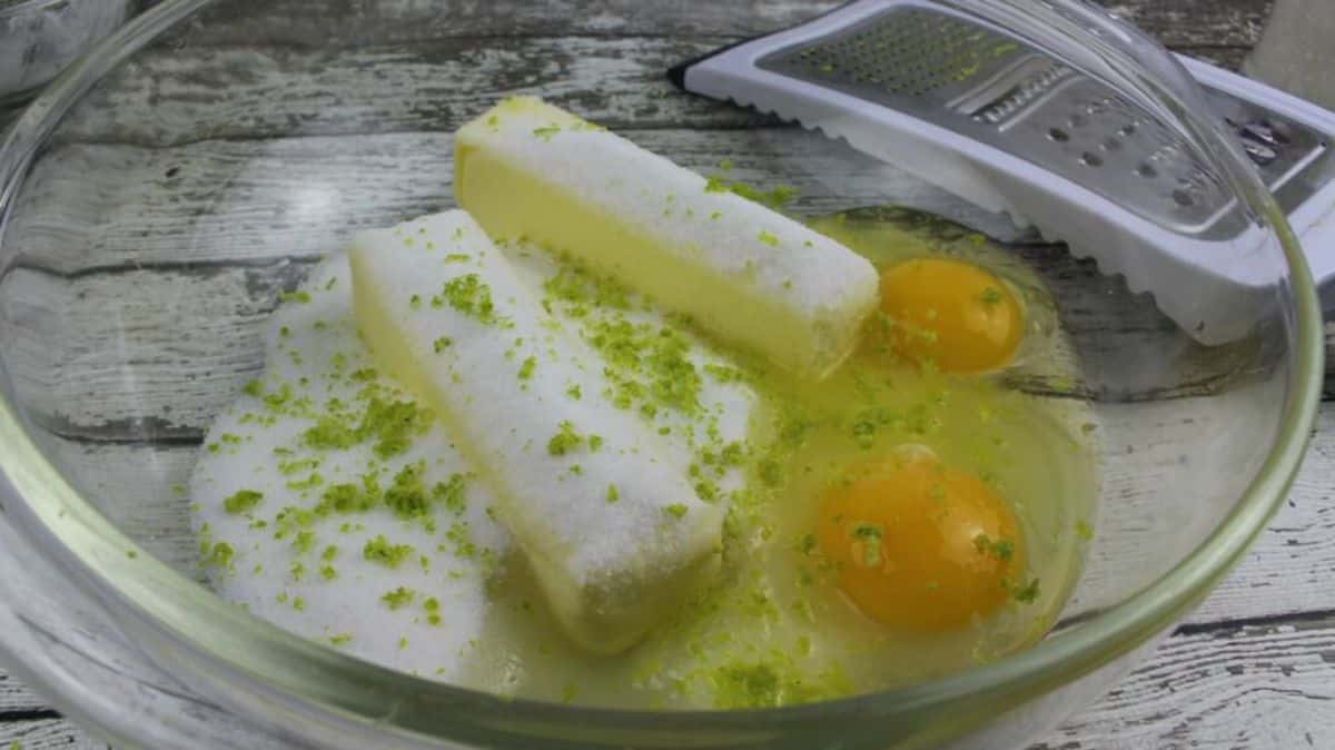butter, sugar, eggs, tequila, lime juice and lime zest in a large mixing bowl.