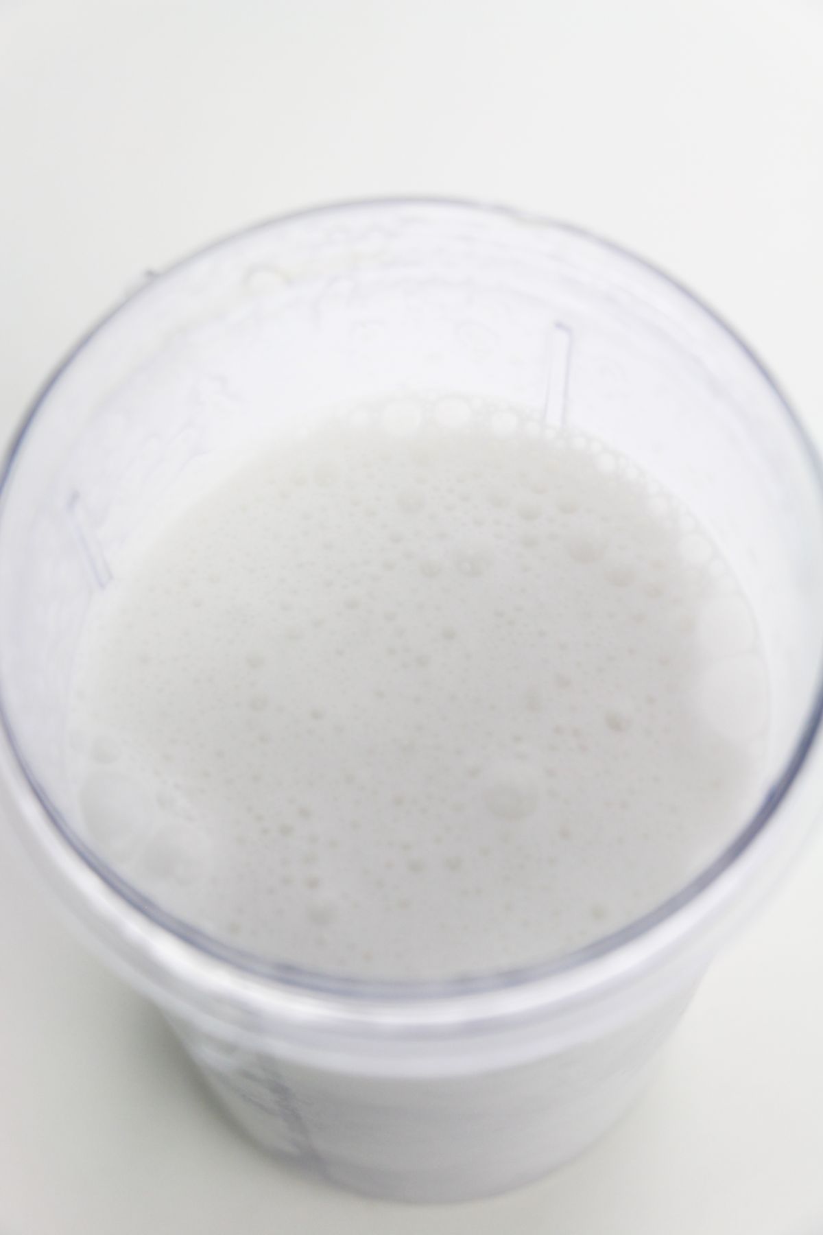 Whipped Pina Colada Recipe With Coconut Milk in a blender.