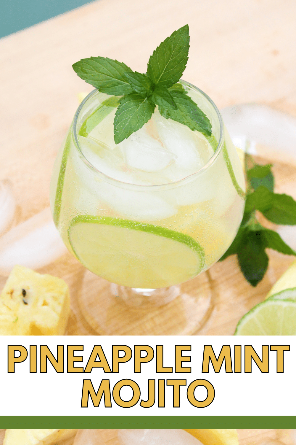 Pineapple Mint Mojito is a must-try beverage with a burst of tropical flavors filled with sweetness, tanginess, and a minty hint of rum. #pineapplemintmojito #pineapplemojitorecipe #pineapple #mojito #summerbeverage via @wondermomwannab