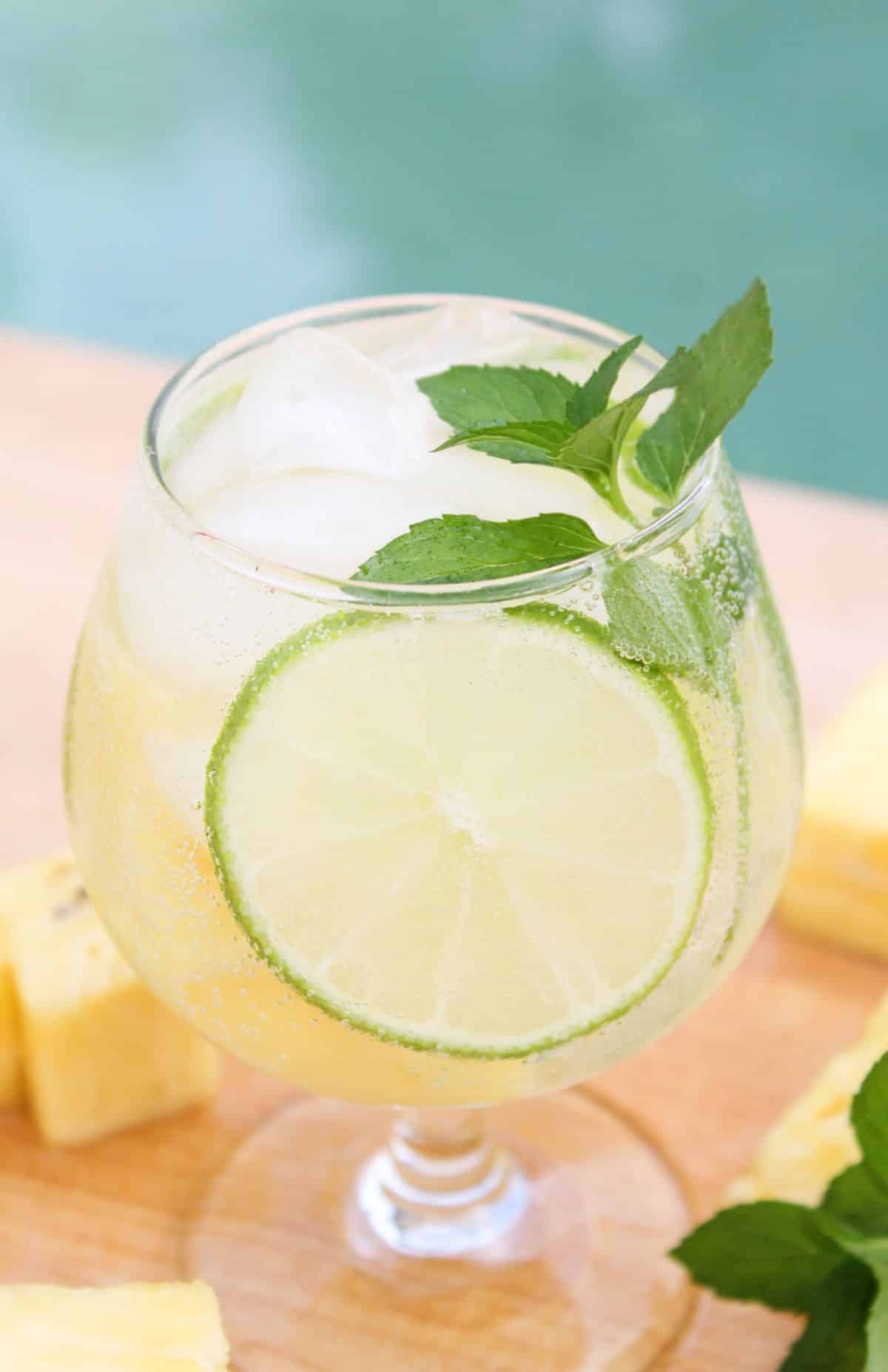 Pineapple Mint Mojito in a serving glass, garnished with mint leaves.