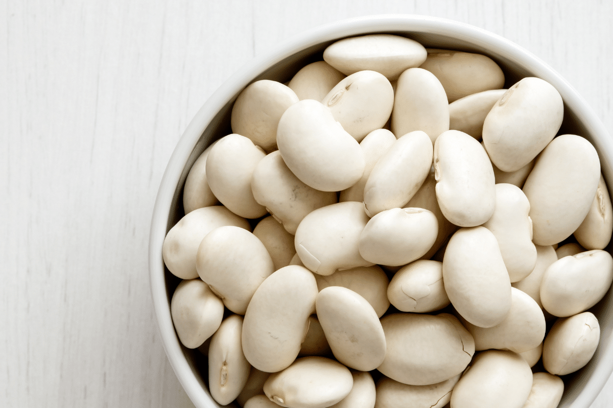 Close-up view of Butter Beans in a white bowl.