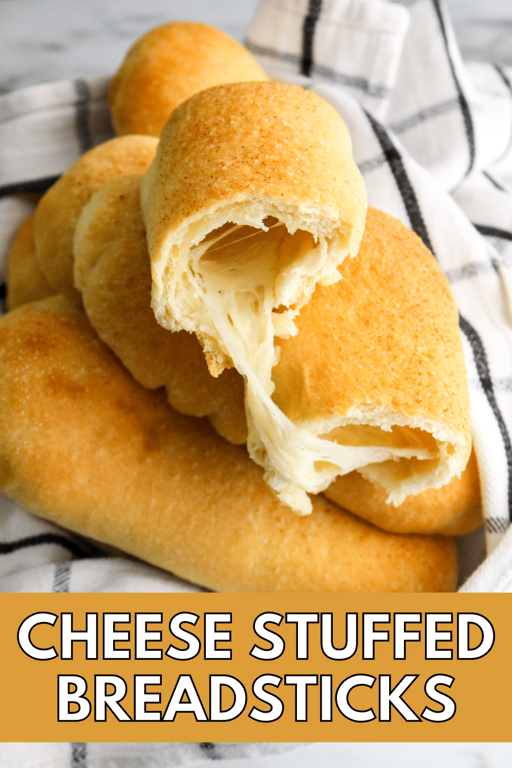 Stuffed breadsticks filled with cheese.