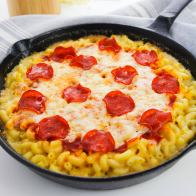 Pepperoni added to classic macaroni and cheese creates a pizza-inspired skillet dish.
