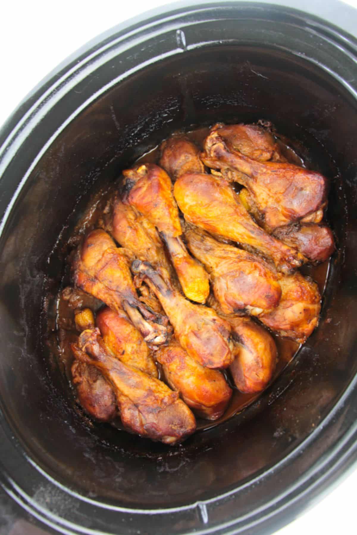 BBQ chicken legs in a crock pot.