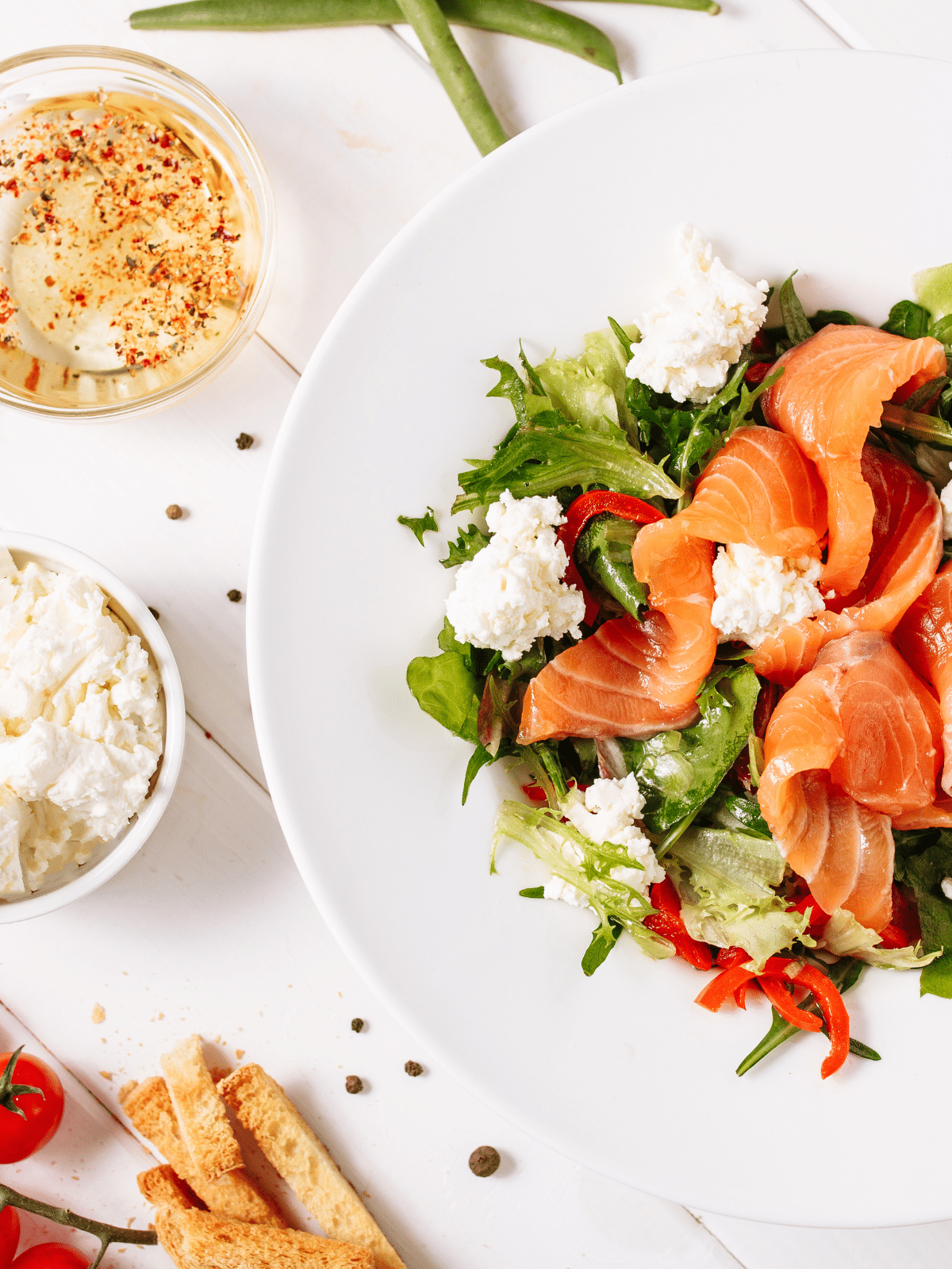 A plate of salmon salad with ricotta cheese.