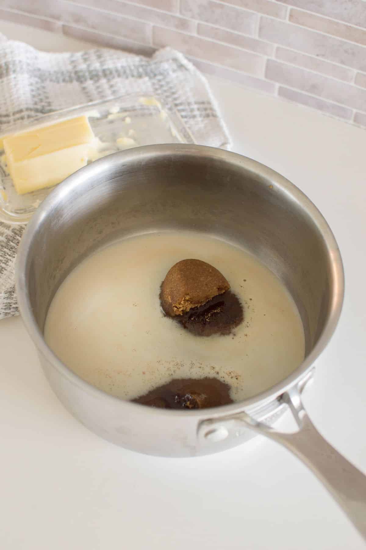 Brown sugar and milk in a small sauce pan.
