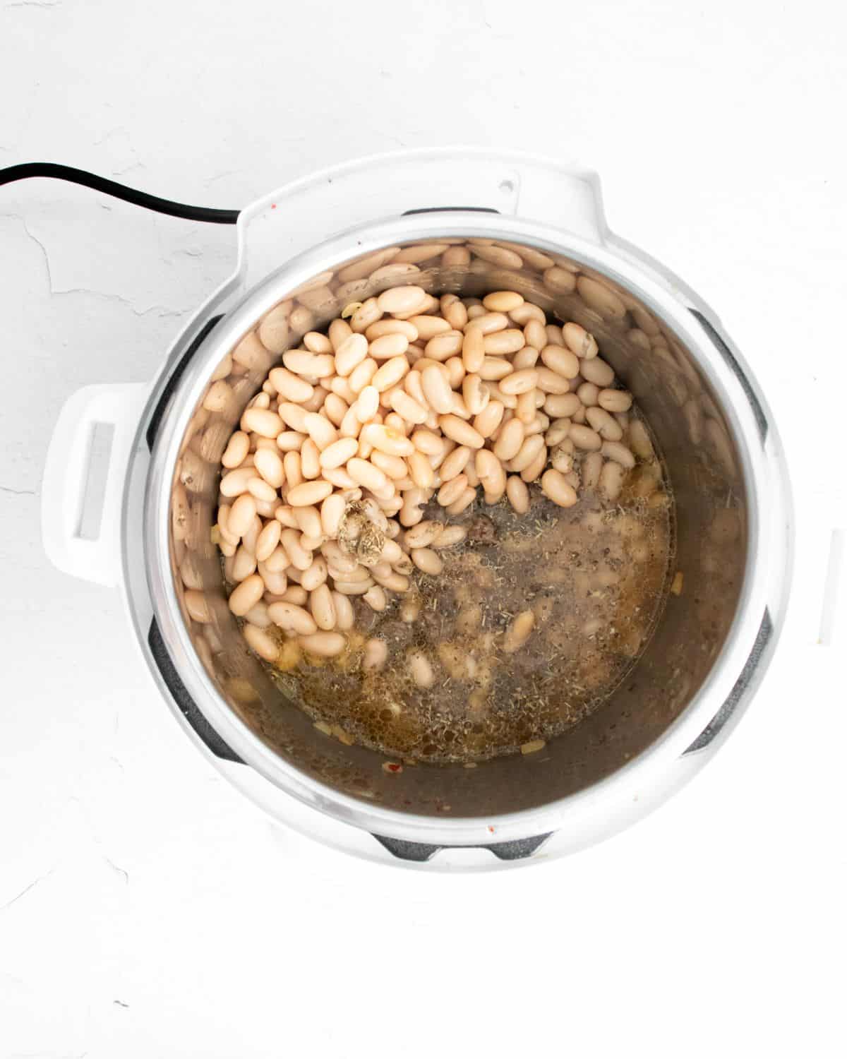 White beans and sausage cooked in an instant pot.